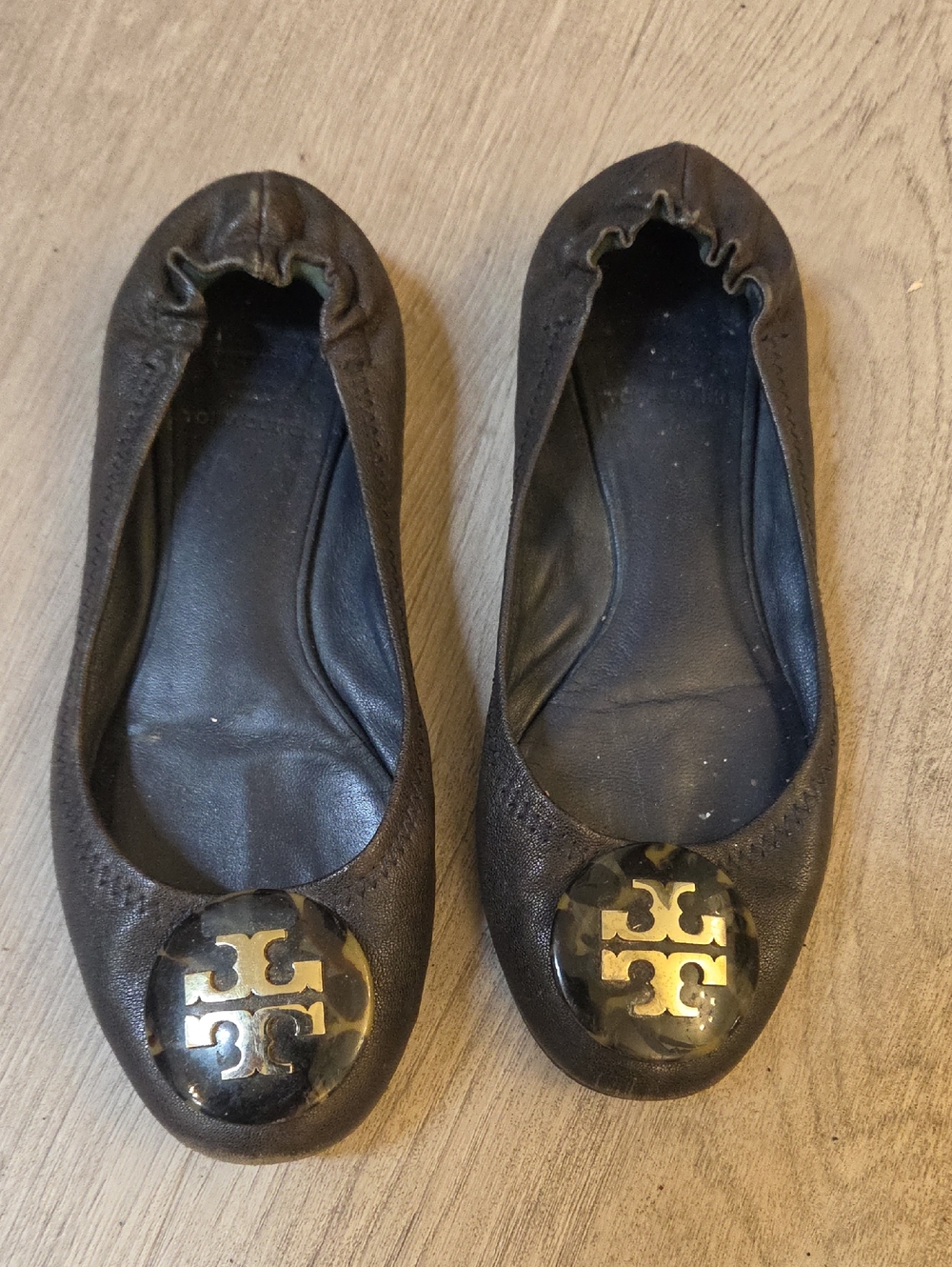 Tory Burch Black Ballet Flats with Gold Logo Medallion
